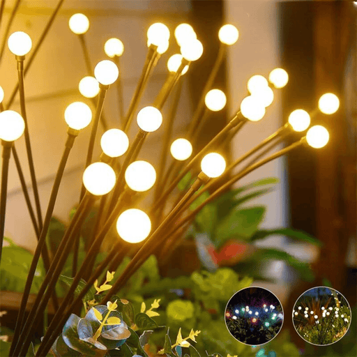 Close-up of the solar-powered garden lights glowing with warm white light in an outdoor setting. The insets show the lights glowing in different colors and warm white.