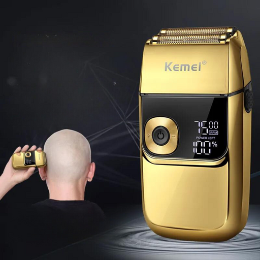 A gold Kemei shaver being used by a person to shave their head, highlighting its ergonomic design and ease of use.