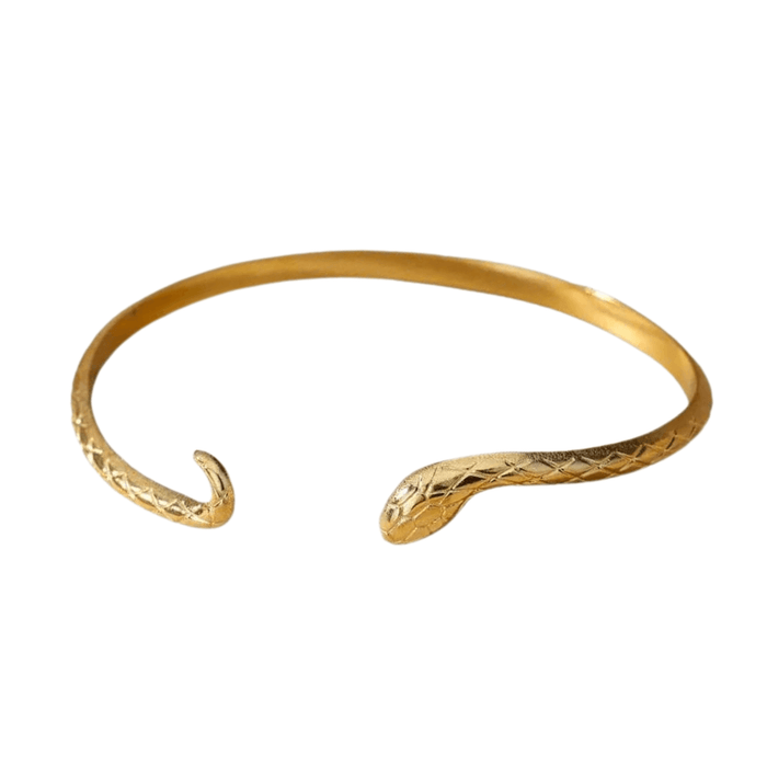 Thin gold bracelet with a snake design, displayed on a white background.