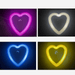 Four heart-shaped night lights glowing in different colors: pink, white, blue, and yellow, each casting a soft, ambient light suitable for creating a cozy atmosphere in any room.