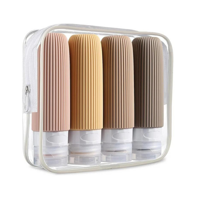 Transparent travel case containing four ridged travel bottles in shades of pink, brown, beige, and gray. Each bottle is designed with a secure, clear cap, ideal for storing and organizing essential liquids such as shampoos, conditioners, and lotions for travel.