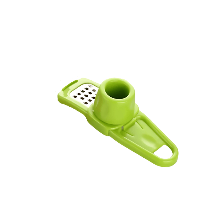 A green handheld grater with a small container.