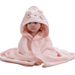 A baby wrapped in a pink hooded towel designed to look like a cat. The hood features an embroidered cat face with ears. The baby is sitting with the towel draped around them, looking warm and secure.