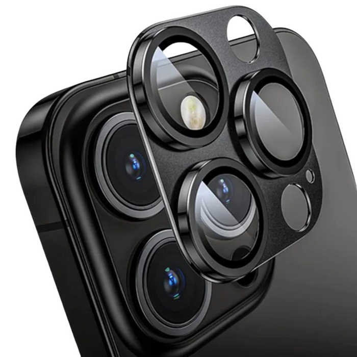 Close-up of a black camera lens protector on an iPhone.