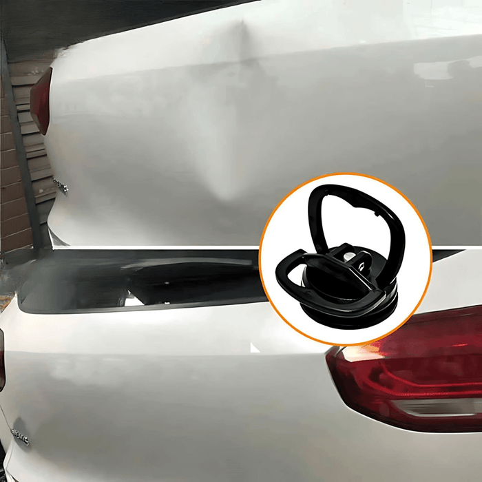 A close-up view of the rear of a white car with a circular inset showing a black suction cup, suggesting its use for automotive body repair.