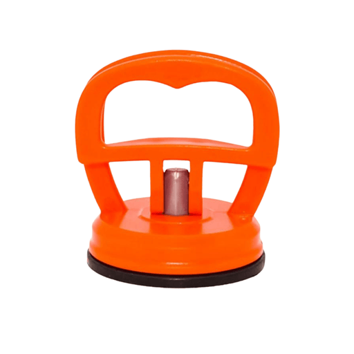 An orange suction cup tool used for car repair, featuring a prominent handle with a hollow center for grip and a metallic central pillar connected to the black suction mechanism at the base.