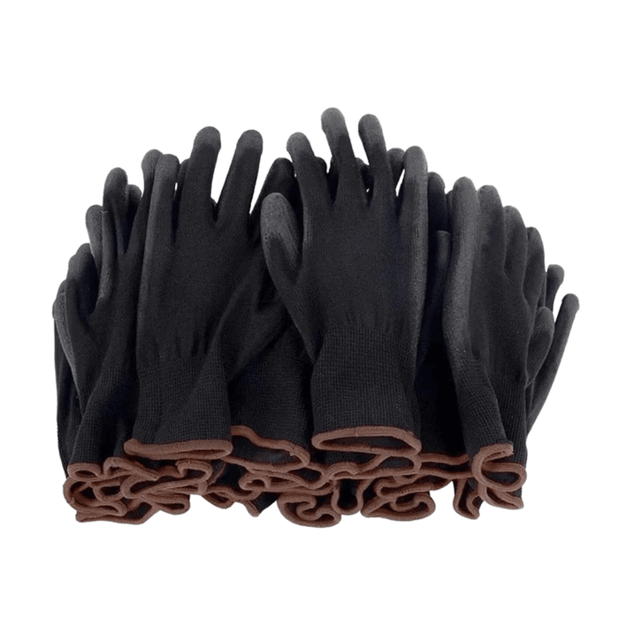 The image shows a large quantity of black work gloves stacked together. The gloves have a brown hem at the wrist.