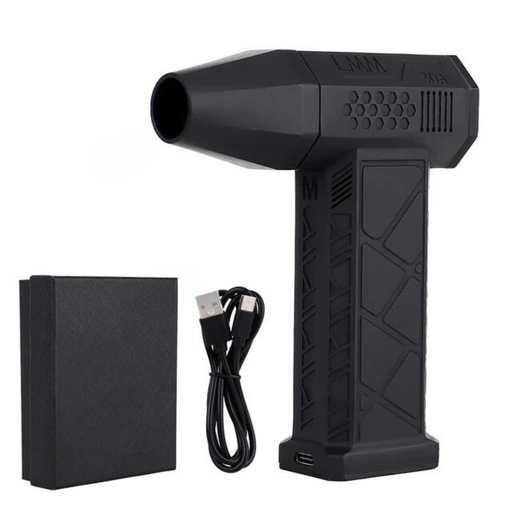 A black handheld blower displayed alongside its accessories, including a USB charging cable and a black box. The blower has a sleek design with a prominent nozzle.