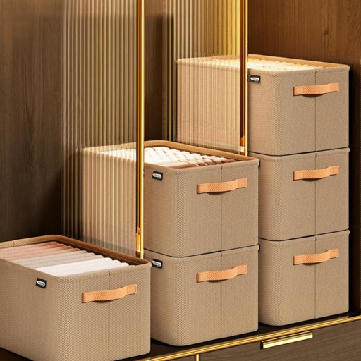 Several stacked beige organizers in a closet setting. It demonstrates the organizers' suitability for maximizing storage space in closets.