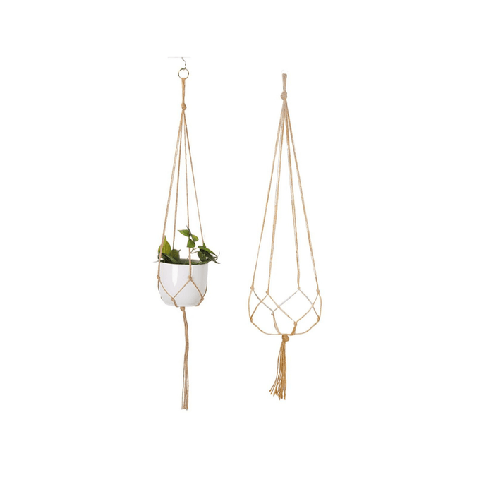 A single macrame plant holder with two tiers, each holding a white pot with green plants. The top pot has a design with brown dripping glaze.