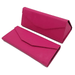 two pink eyeglasses cases with a textured fabric exterior. One case is closed and lying flat, while the other is standing upright and open, showing the geometric design and envelope-style flap closure.