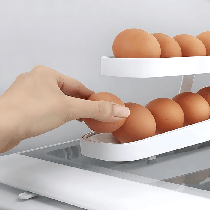 A hand taking an egg from a white egg holder filled with brown eggs, placed inside a refrigerator. The background of the image is white.