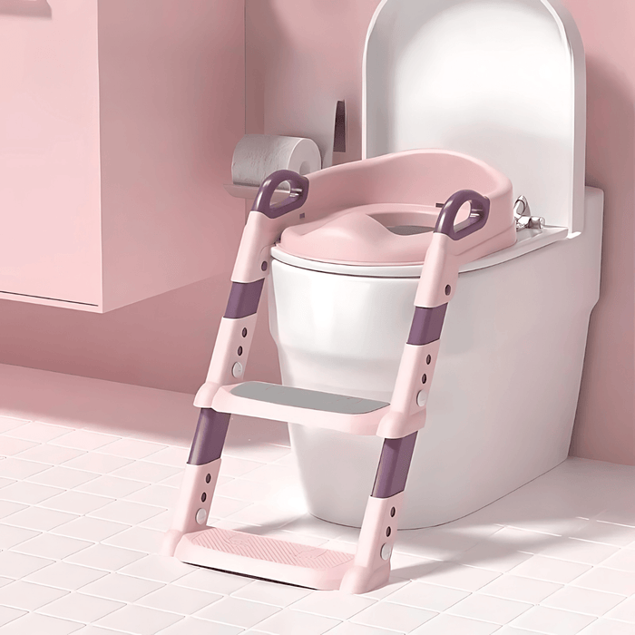 A pink and purple toddler toilet seat with attached step ladder placed in a pink-themed bathroom.