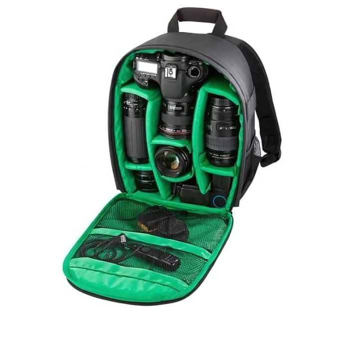 Open camera backpack with a green interior, showing compartments for a camera, lenses, and accessories.