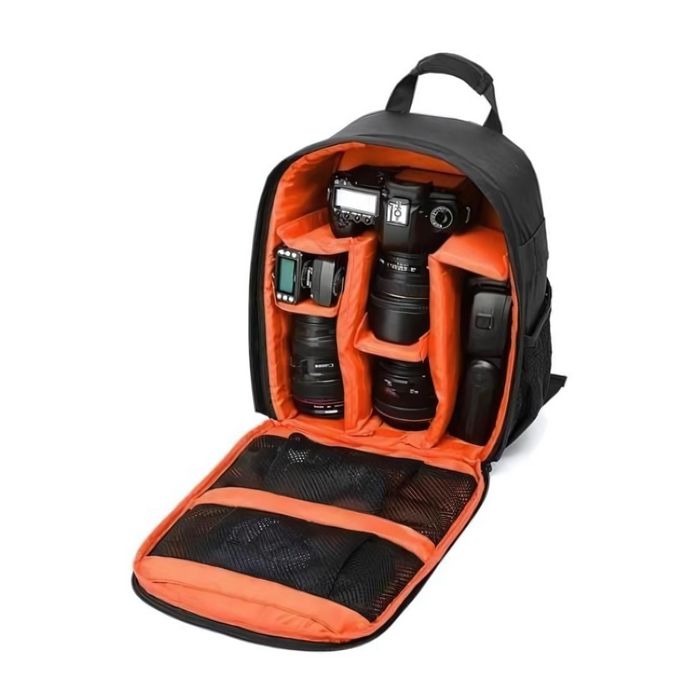 Open camera backpack with a orange interior, showing compartments for a camera, lenses, and accessories.