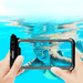 Hands holding a smartphone inside a black waterproof case, displaying a child swimming underwater. It demonstrates the case's clarity and the ability to use the phone's camera through the case under the water.