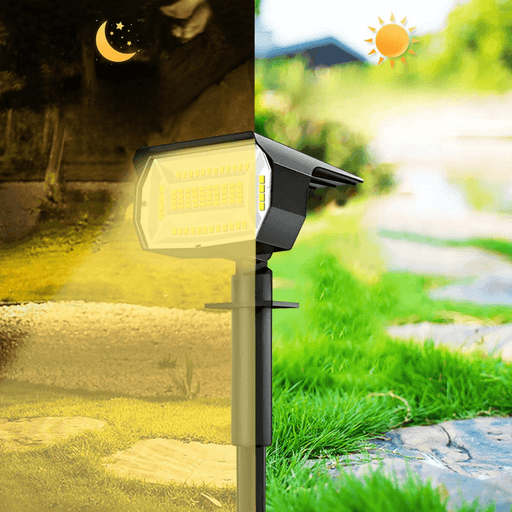 Black solar light with a day-night transition effect, showing it illuminated at night.