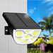 Black solar light with white LEDs mounted on a wall.