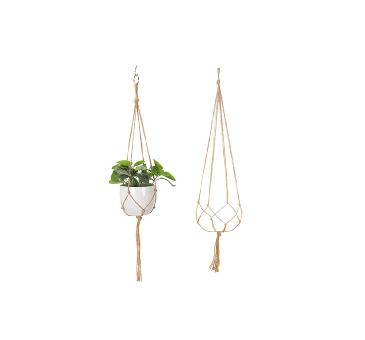 A single macrame plant holder with two tiers, each holding a white pot with green plants. The top pot has a design with brown dripping glaze.