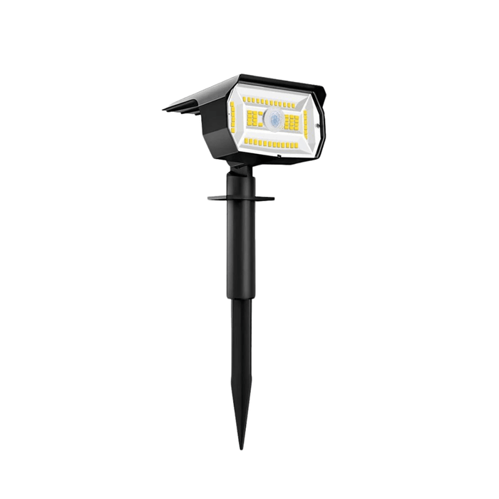 Black solar light with yellow LEDs, shown in a ground-stake configuration.