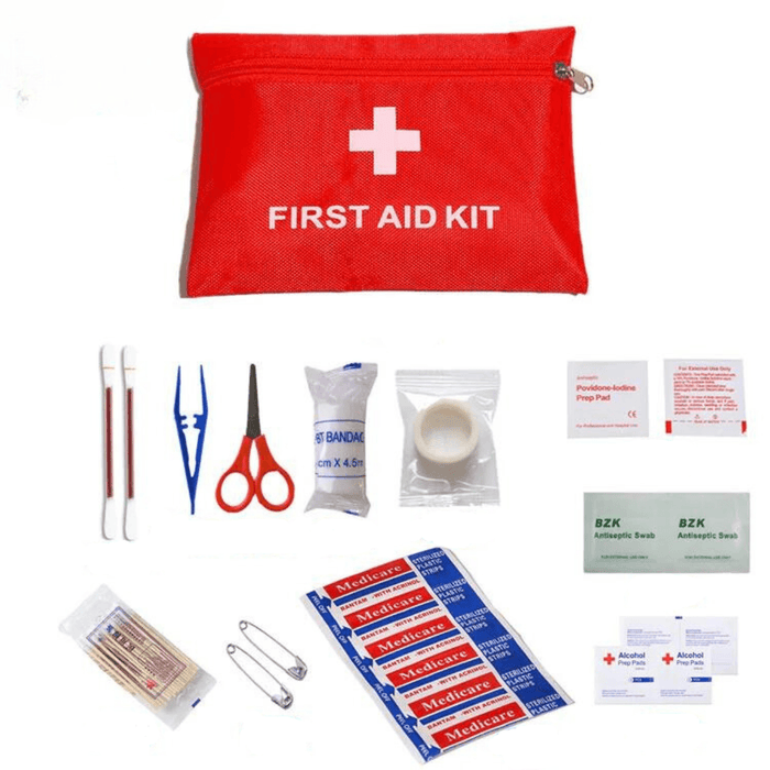 A red first aid kit pouch on a white background. Medical supplies such as scissors, an elastic bandage roll, sterile gauze pads, and antiseptic wipes are neatly displayed.  The dimensions of the pouch are indicated as 7.87 inches wide by 5.5 inches tall.