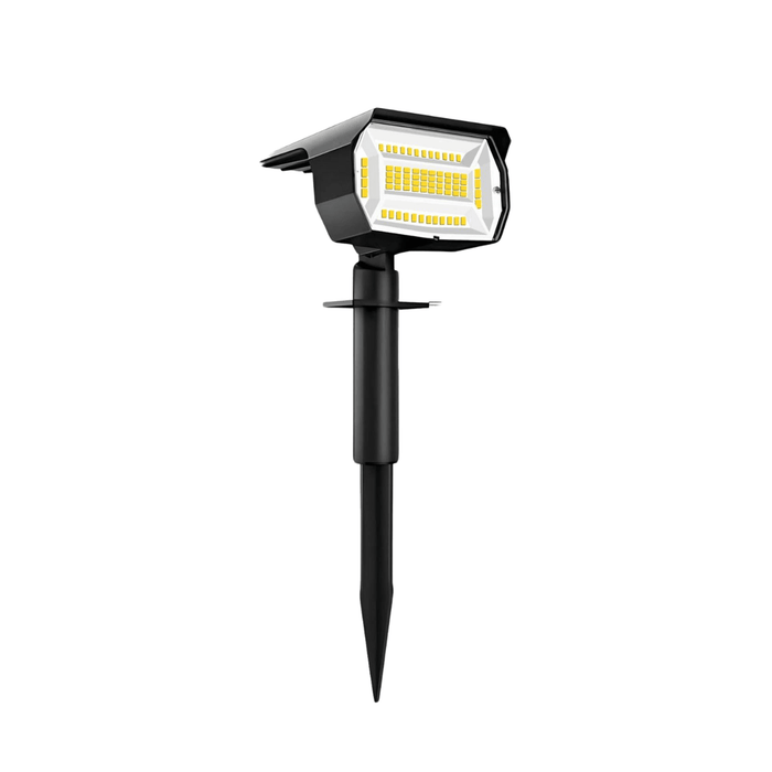 Black solar light with yellow LEDs, shown in a ground-stake configuration.