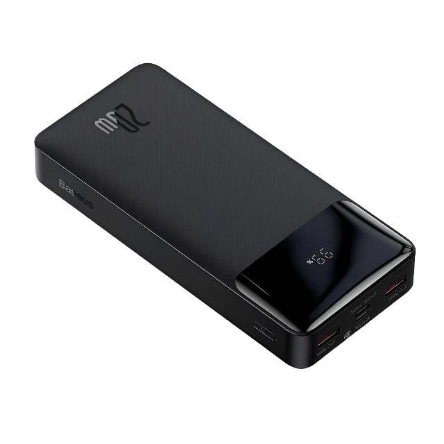 A sleek black power bank with a digital display showing the remaining battery percentage. The device features multiple ports for charging various devices.