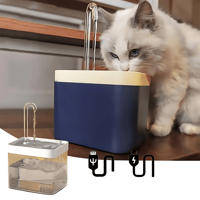 A white cat with blue eyes is drinking from a dark blue and beige water fountain. The fountain has a clear curved spout. Below the main image is a smaller image of the fountain, along with icons of a USB cable and a power plug, indicating charging options.