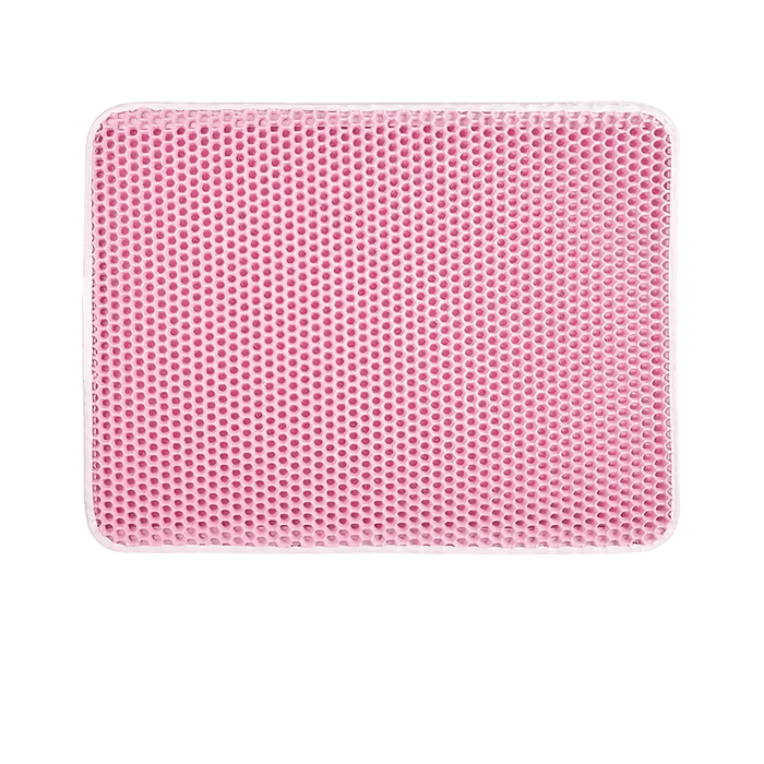 A pink cat mat designed to trap sand from cat paws, helping to keep the house clean. The mat features a textured surface with numerous small holes that capture the litter as a cat steps on it after using the litter box.