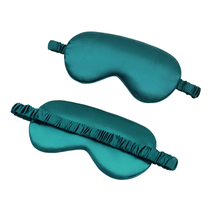 Green sleep eye mask shown from front and back.