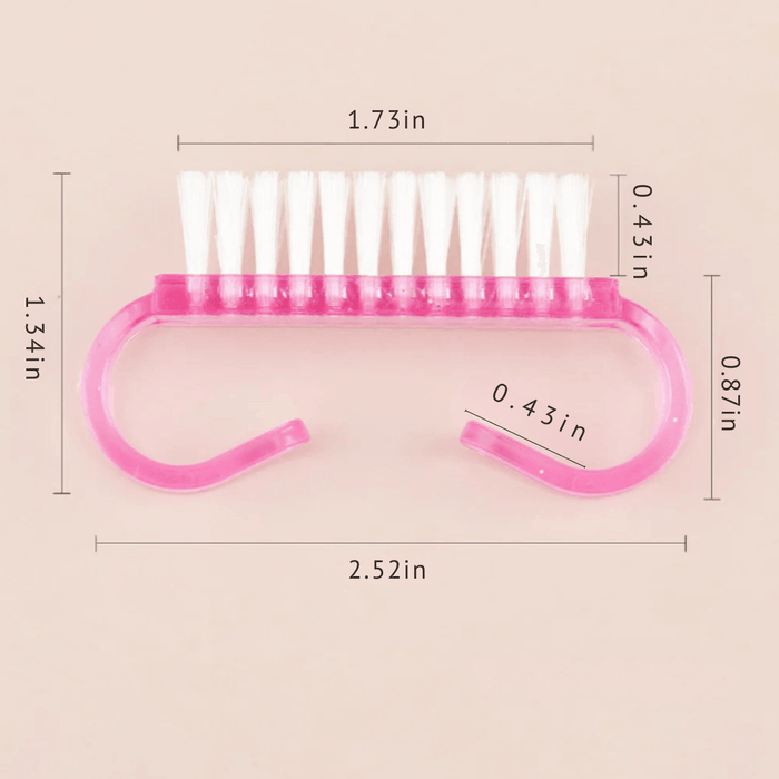 a pink nail brush with white bristles and measurements indicated: 2.52 inches in length, 1.34 inches in height, and 0.87 inches in width. The bristle length is 1.73 inches, and the handle width is 0.43 inches.