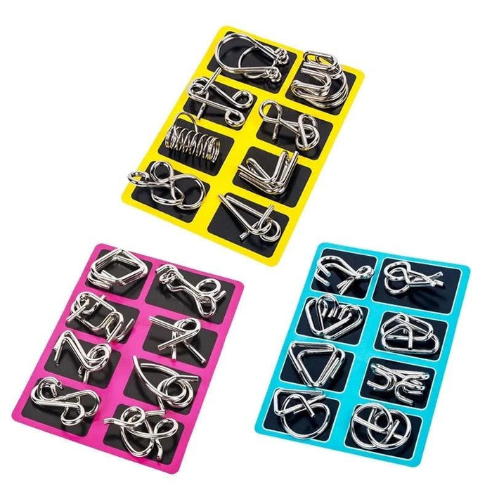 Three sets of metal wire puzzles arranged in yellow, pink, and blue trays, each containing eight uniquely shaped puzzles.