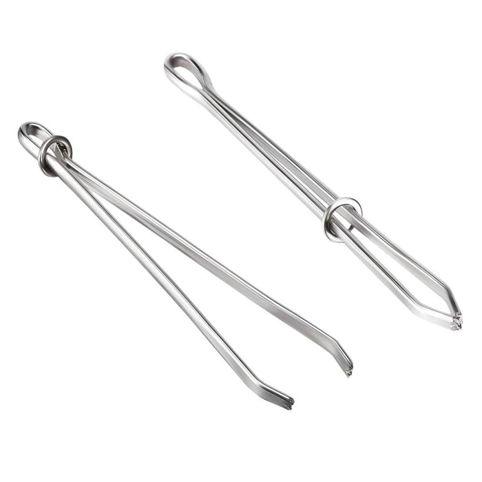 Two Garment Clips Sewing Tools, one open and one closed.