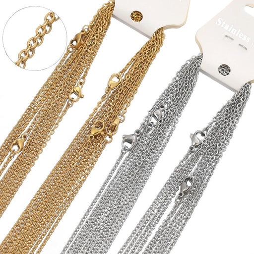 A side-by-side display of multiple stainless steel chains in both gold and silver tones, each featuring lobster clasps for easy attachment.