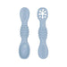 A close-up of two blue baby spoons, one with a regular spoon shape and the other with a cut-out flower design, against a white background.