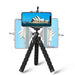 Black flexible tripod with a phone attached, showing its rotation capabilities and stability.