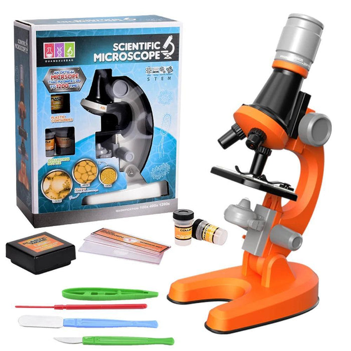 An orange and black microscope with a boxed set, including tools and sample containers, labeled as a scientific microscope with magnification up to 1200x.