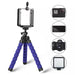 A flexible tripod with blue foam legs and a black adjustable phone holder, shown with compatibility options for a GoPro, smartphone, DSLR camera, and LED light.