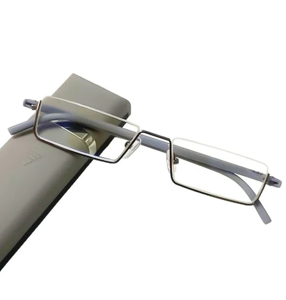 A pair of rectangular eyeglasses with thin, gray frames and clear lenses is placed on a gray eyeglass case. The background is white, highlighting the contrast between the gray frames and the clear lenses.