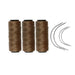 Three khaki rolls of sewing thread with four needles.