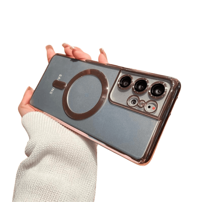 A phone case with a pink magnetic ring held in hand, illustrating the stylish design.