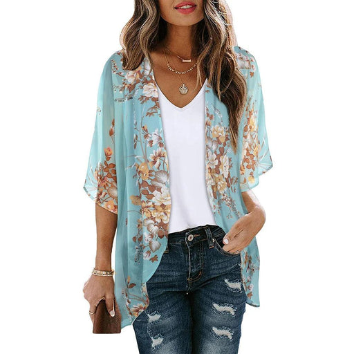 Floral Light Blue Kimono shown on a model.