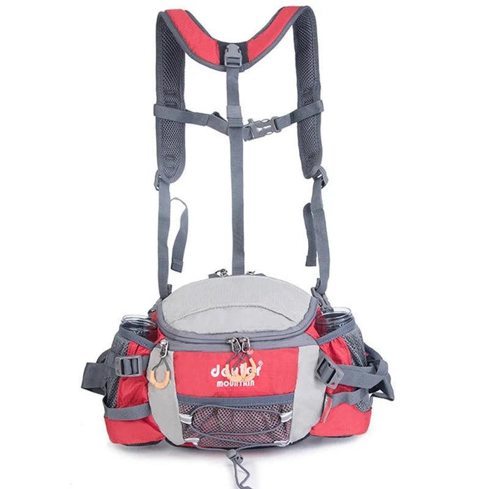 A front view of the red waist pack highlights its various compartments and storage features. The pack includes multiple zippered pockets, elastic cords for additional gear storage, and dedicated bottle holders on each side. The harness system includes padded shoulder straps for additional support, ensuring comfort during long treks.