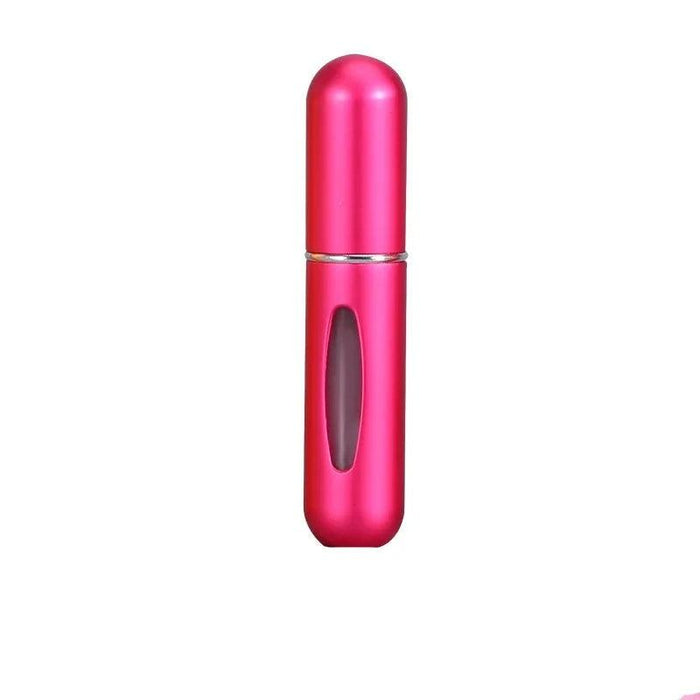 A hot pink portable perfume spray bottle with a transparent window.