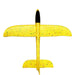 a top-down view of the fully assembled orange foam glider with yellow speckles, emphasizing its simple yet effective design.