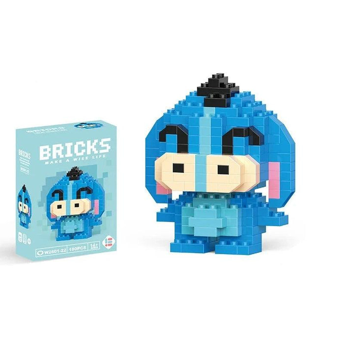 A single block-style toy figure of blue donkey, along with its light blue packaging box. Display on white background.