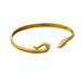 Gold cuff bracelet designed to look like a snake with engraved scales, displayed on a white background.