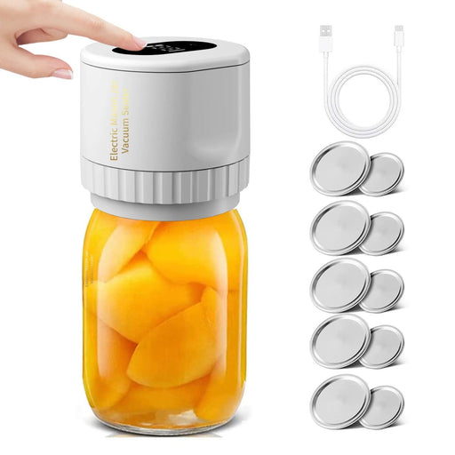 White electric mason jar vacuum sealer in use on a jar of preserved fruit, with accessories like a USB cable and sealing lids.