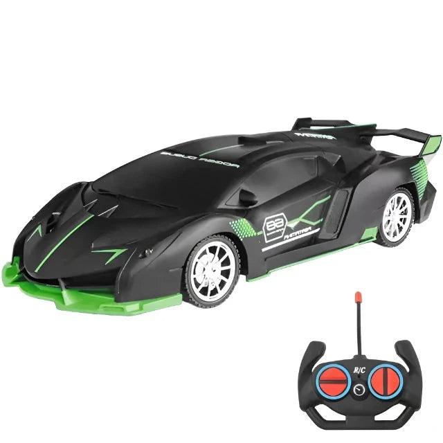 A black sports car with green accents and an accompanying remote control. The car has a sleek, angular design and a large rear spoiler.