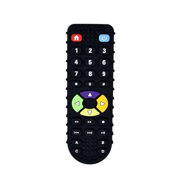 A black silicone teether shaped like a simple remote control with colorful buttons.